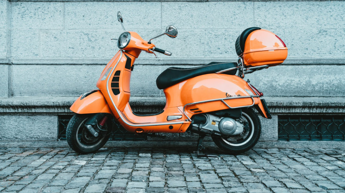 vespa scooter in orange